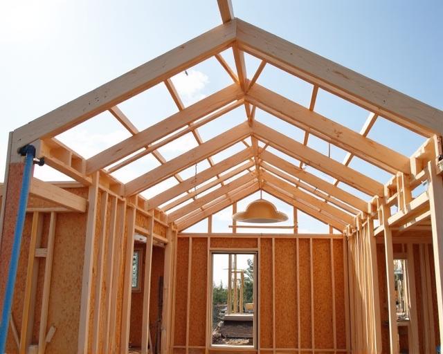 The timber frame of a new custom home under construction.